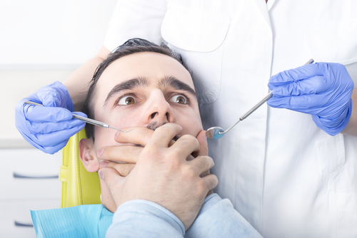 Man frightened at dentist